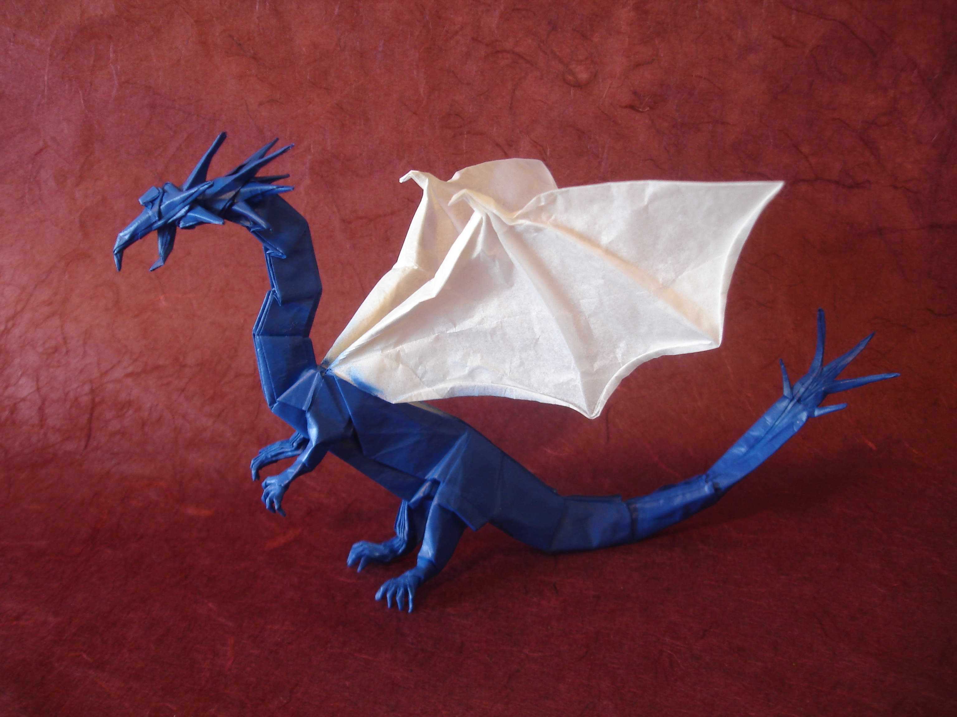 В данном уроке вы научитесь создавать из бумаги прекрасное модульное оригами дракона Наша подробная схема с фото и описанием поможет с легкостью справиться с заданием даже начинающим рукодельницам