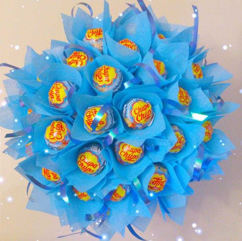 Цветы из гофрированной бумаги с конфетами.мастер-класс+75 фото