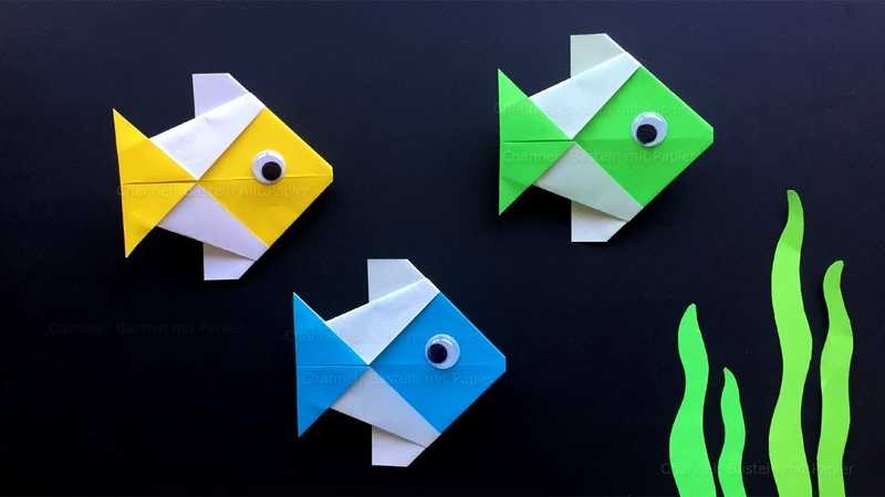 Оригами рыбка — пошаговое описание изготовления, подробные схемы и интересные решения по применению в качестве украшения